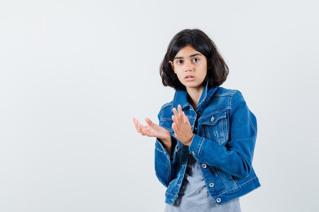 Expressive young girl posing