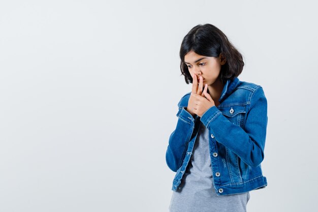 Expressive young girl posing