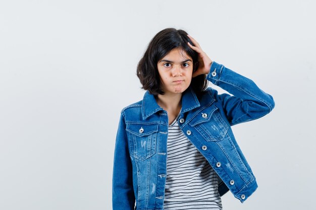 Expressive young girl posing