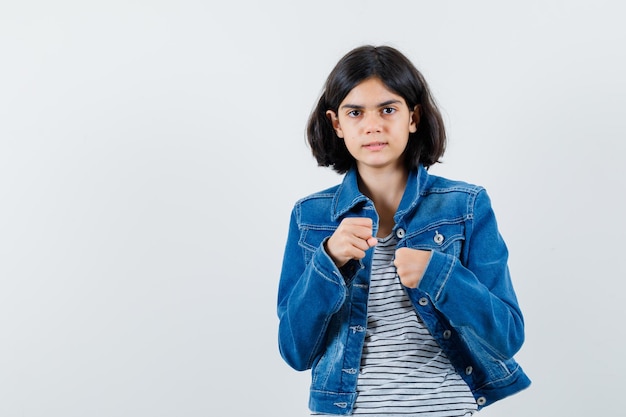 Expressive young girl posing