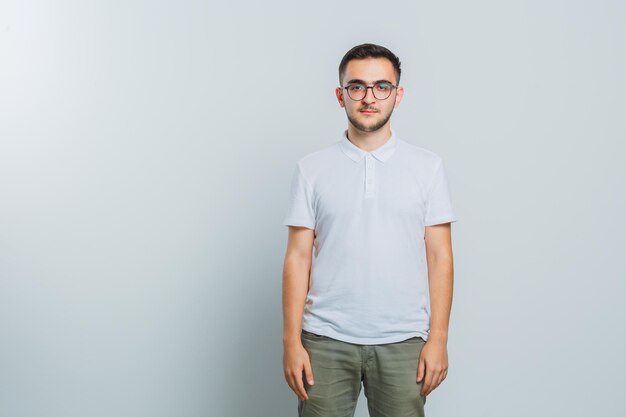 Expressive young guy posing in the studio