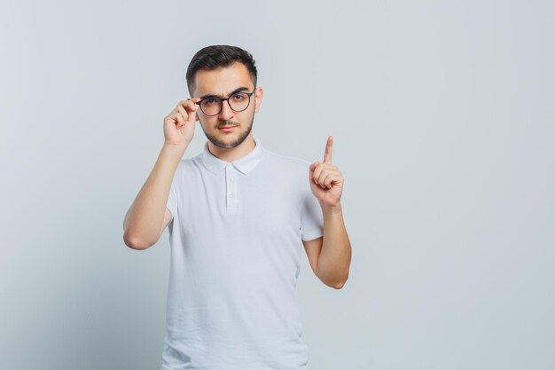 Expressive young guy posing in the studio