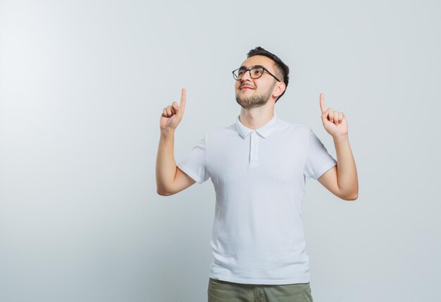 Expressive young guy posing in the studio