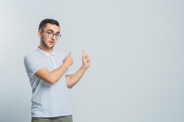 Expressive young guy posing in the studio