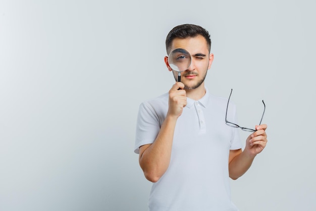 Expressive young guy posing in the studio