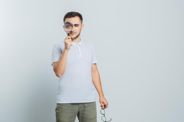 Expressive young guy posing in the studio