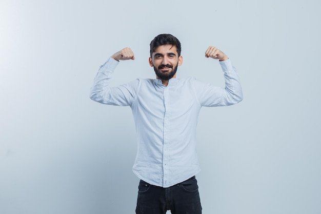 Expressive young guy posing in the studio