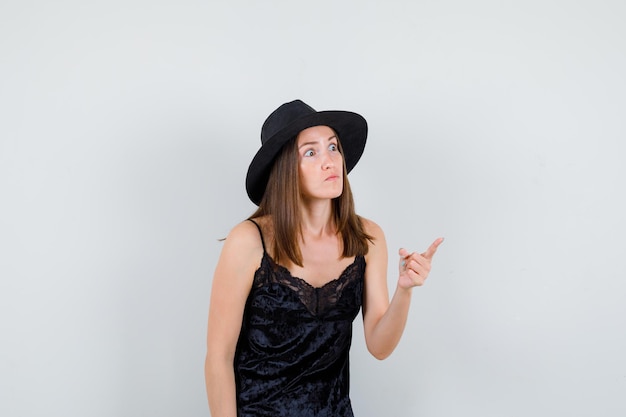 Expressive young lady posing in the studio