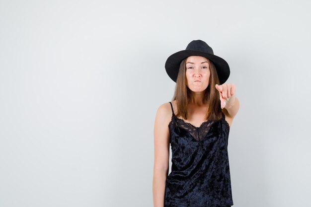 Expressive young lady posing in the studio