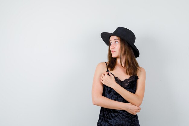 Expressive young lady posing in the studio