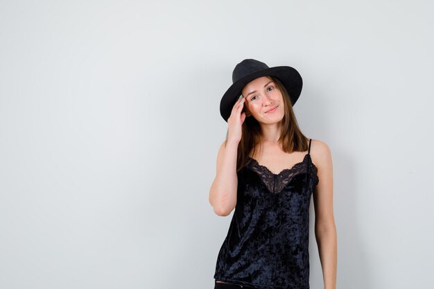 Expressive young lady posing in the studio