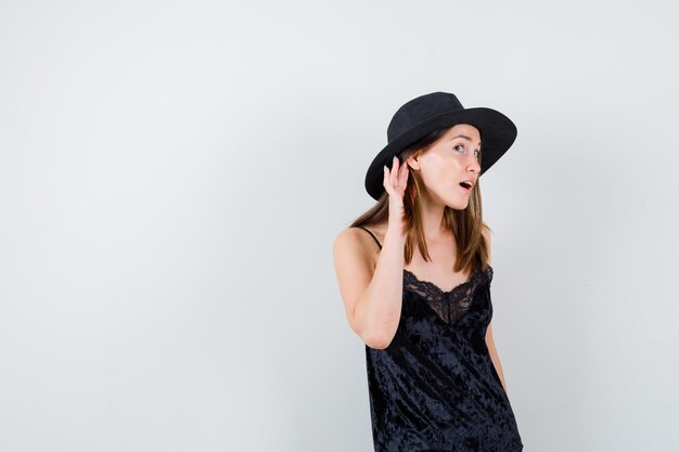 Expressive young lady posing in the studio