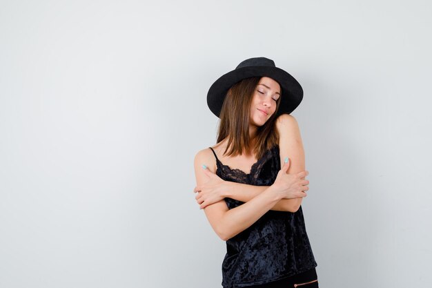 Expressive young lady posing in the studio