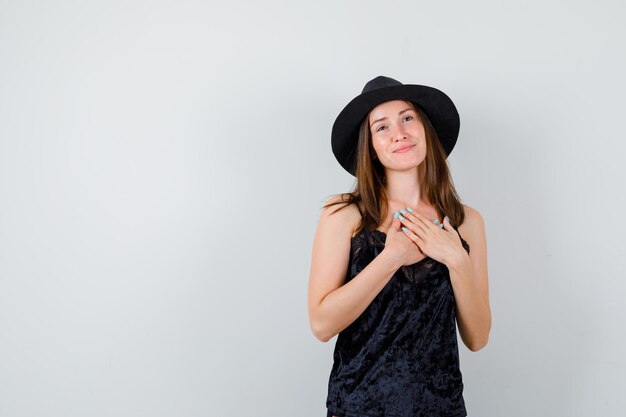 Expressive young lady posing in the studio