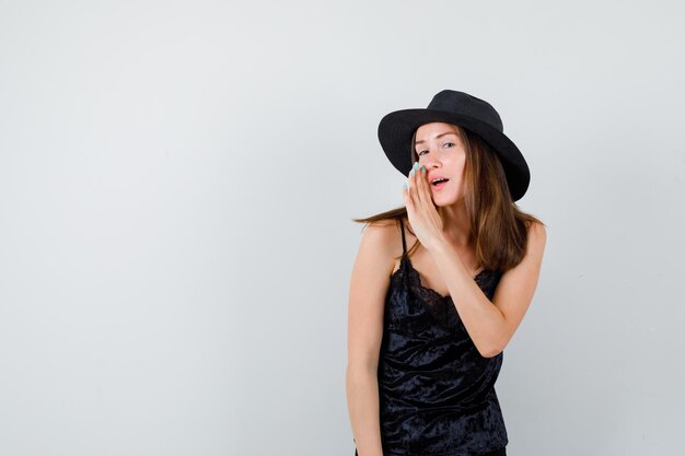 Expressive young lady posing in the studio