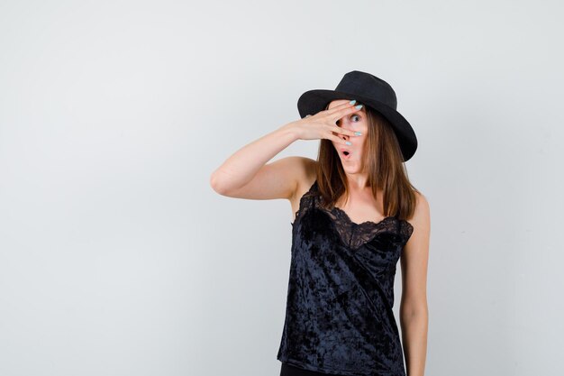 Expressive young lady posing in the studio