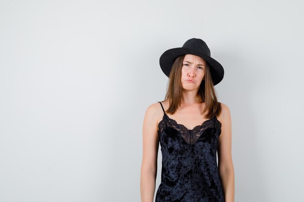 Expressive young lady posing in the studio