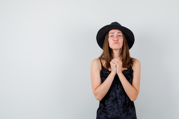 Expressive young lady posing in the studio