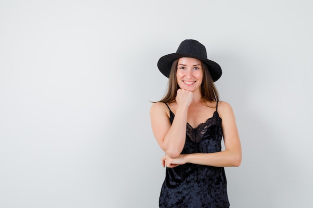 Expressive young lady posing in the studio