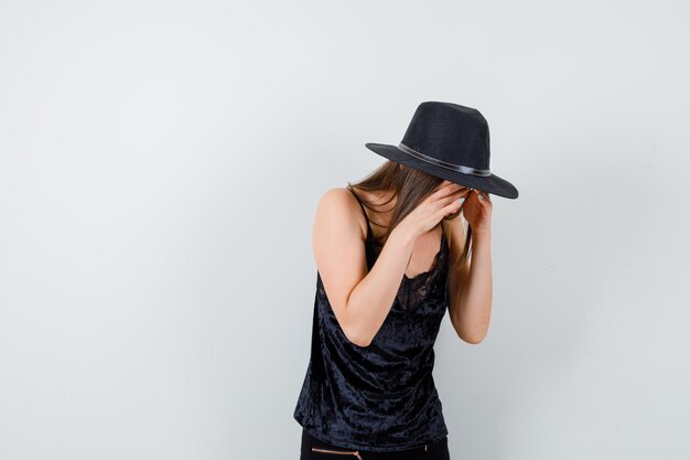 Expressive young lady posing in the studio