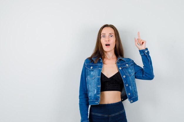 Expressive young lady posing in the studio