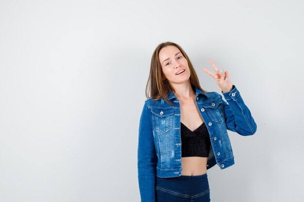 Expressive young lady posing in the studio