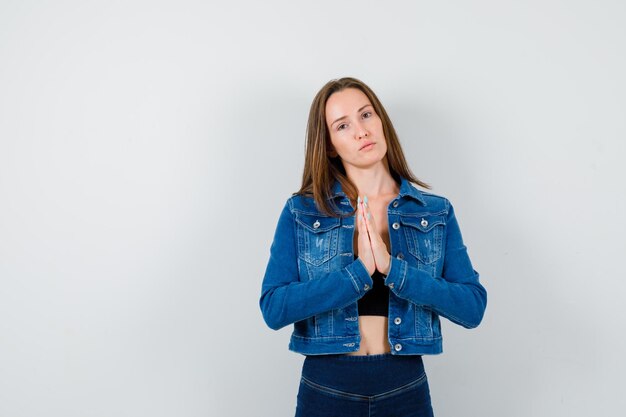 Expressive young lady posing in the studio