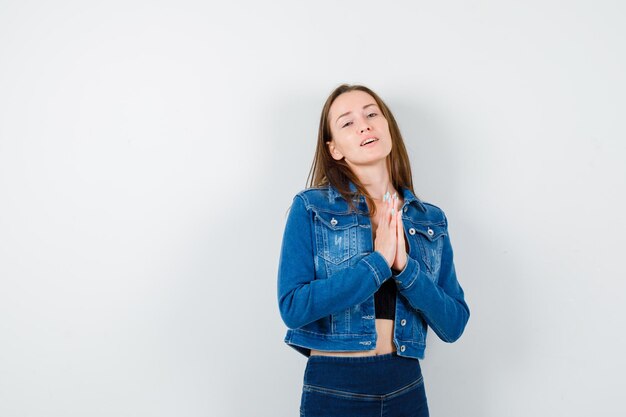 Expressive young lady posing in the studio