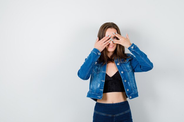 Expressive young lady posing in the studio