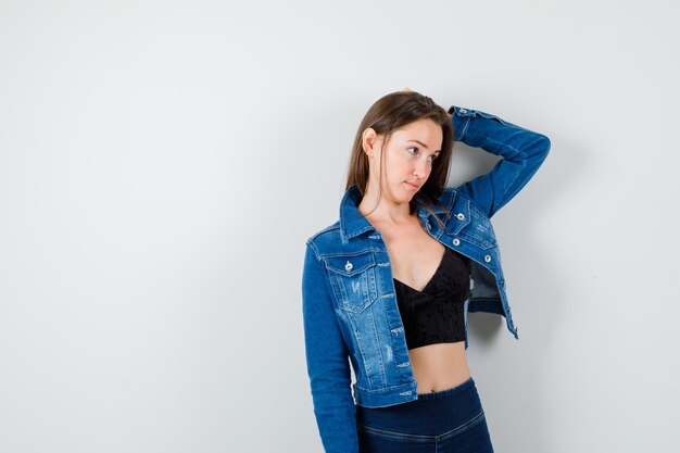 Expressive young lady posing in the studio