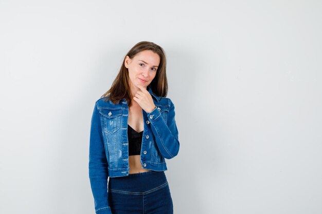 Expressive young lady posing in the studio