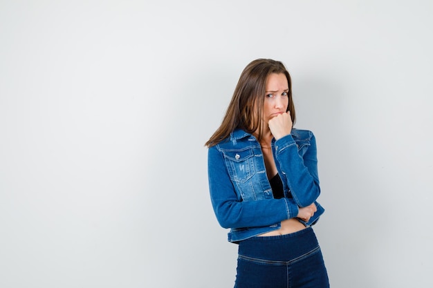 Expressive young lady posing in the studio