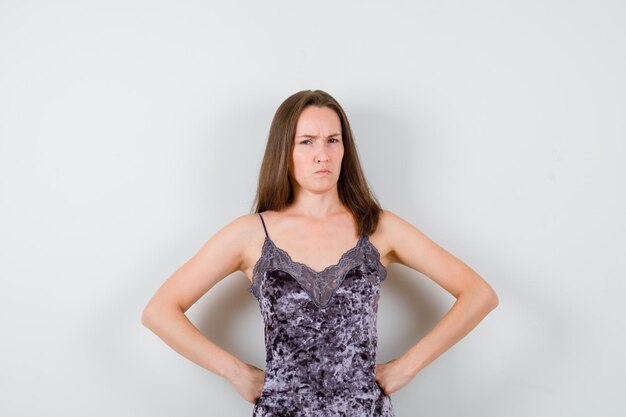 Expressive young lady posing in the studio