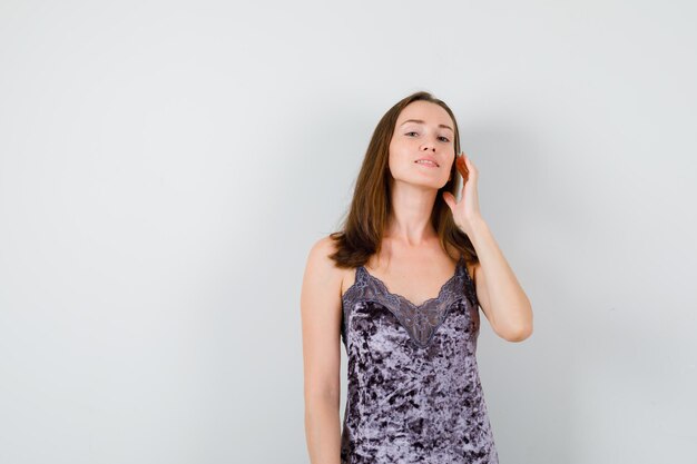 Expressive young lady posing in the studio