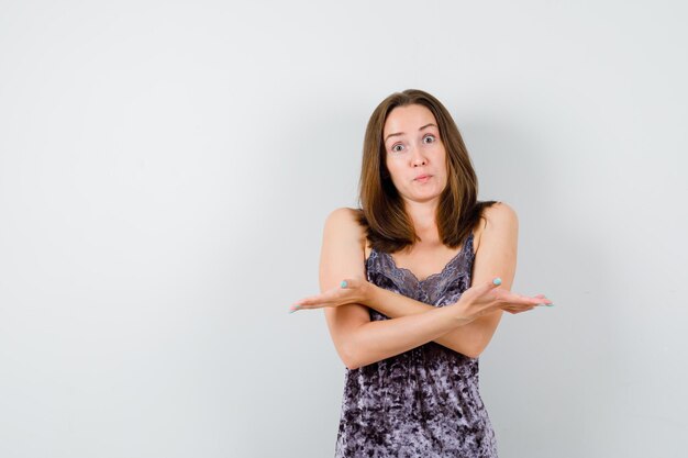 Expressive young lady posing in the studio