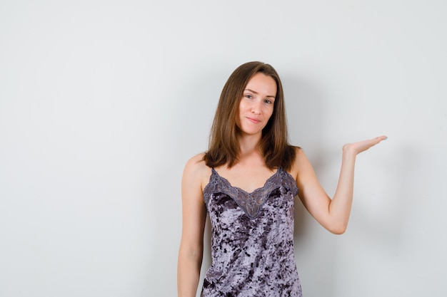 Expressive young lady posing in the studio