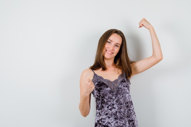 Expressive young lady posing in the studio