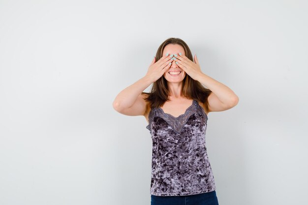 Expressive young lady posing in the studio