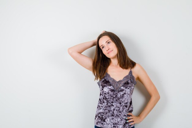 Expressive young lady posing in the studio