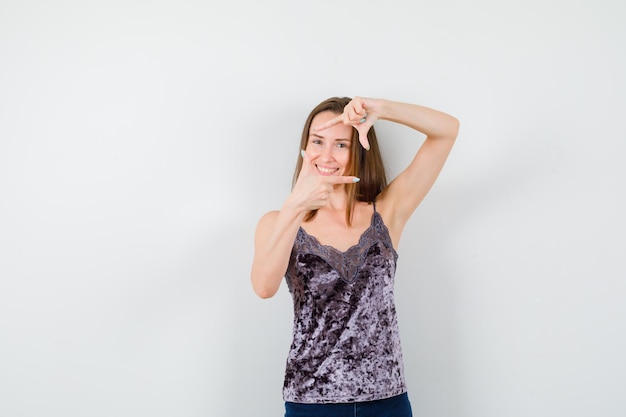 Expressive young lady posing in the studio