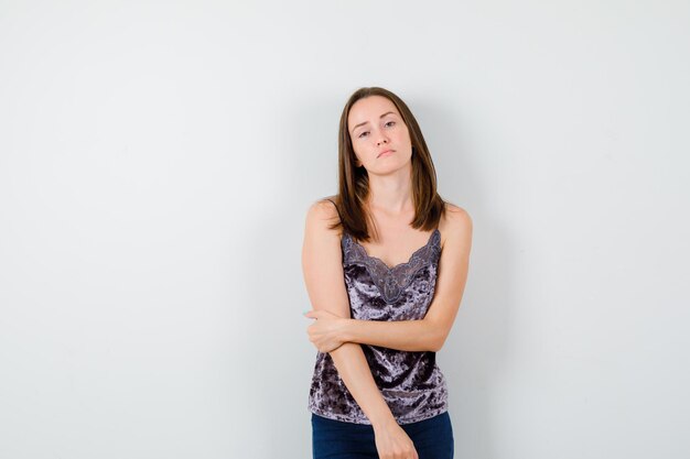 Expressive young lady posing in the studio