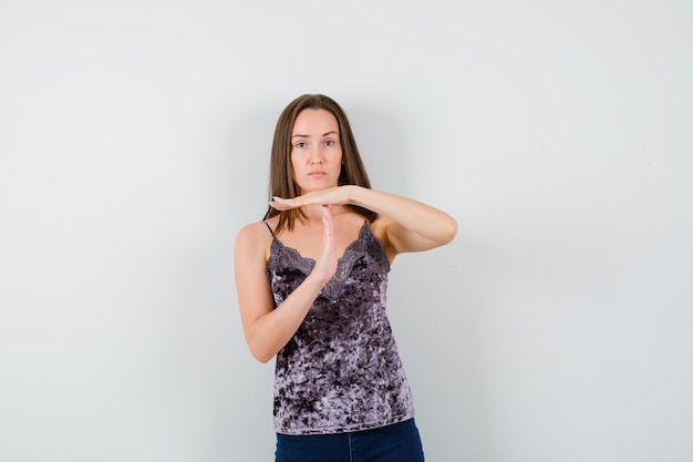 Expressive young lady posing in the studio