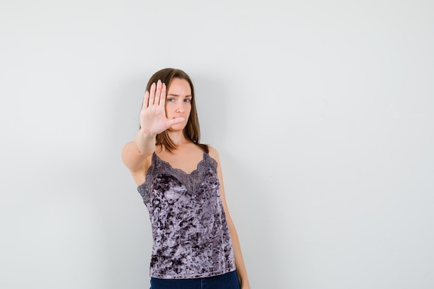 Expressive young lady posing in the studio