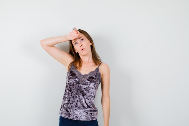 Expressive young lady posing in the studio