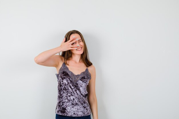 Expressive young lady posing in the studio