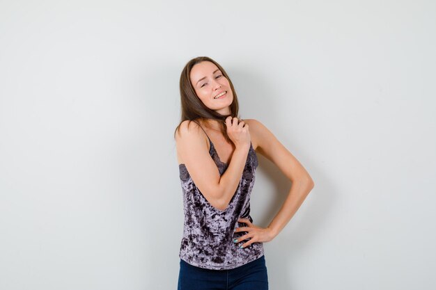 Expressive young lady posing in the studio