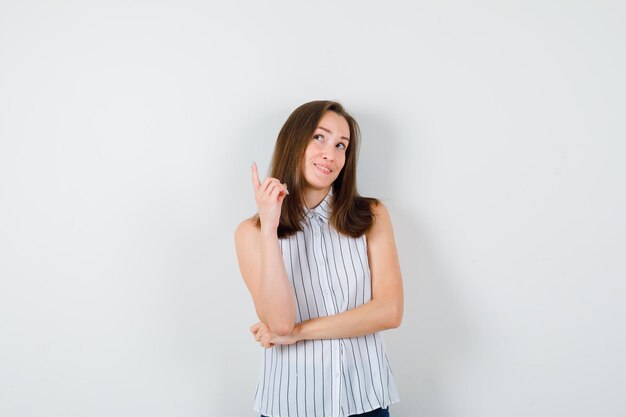 Expressive young lady posing in the studio