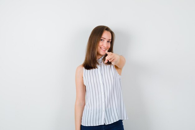 Expressive young lady posing in the studio