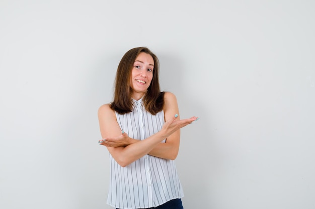 Expressive young lady posing in the studio