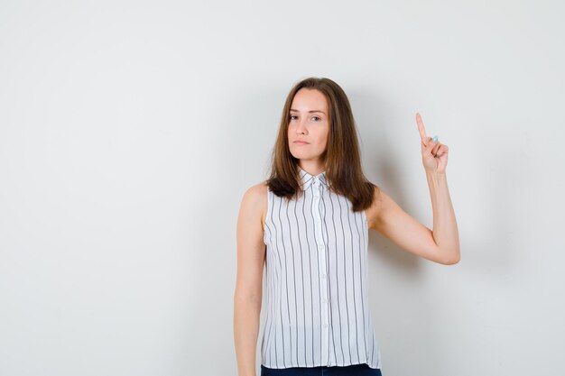 Expressive young lady posing in the studio